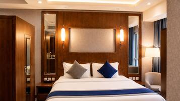 Suite Studio, vue ville | Coffres-forts dans les chambres, bureau