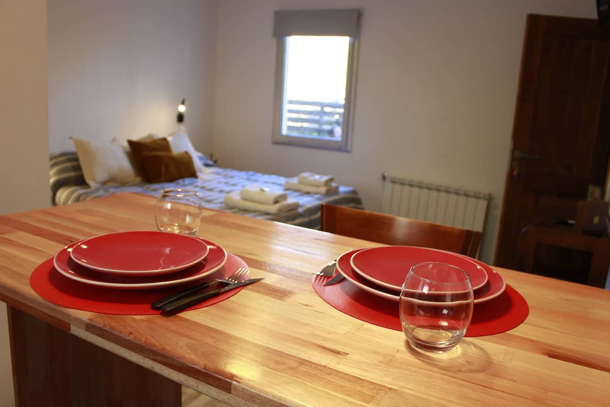 Deluxe Studio, City View | In-room safe, desk, laptop workspace, blackout drapes