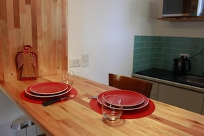 Fridge, microwave, stovetop, cookware/dishes/utensils