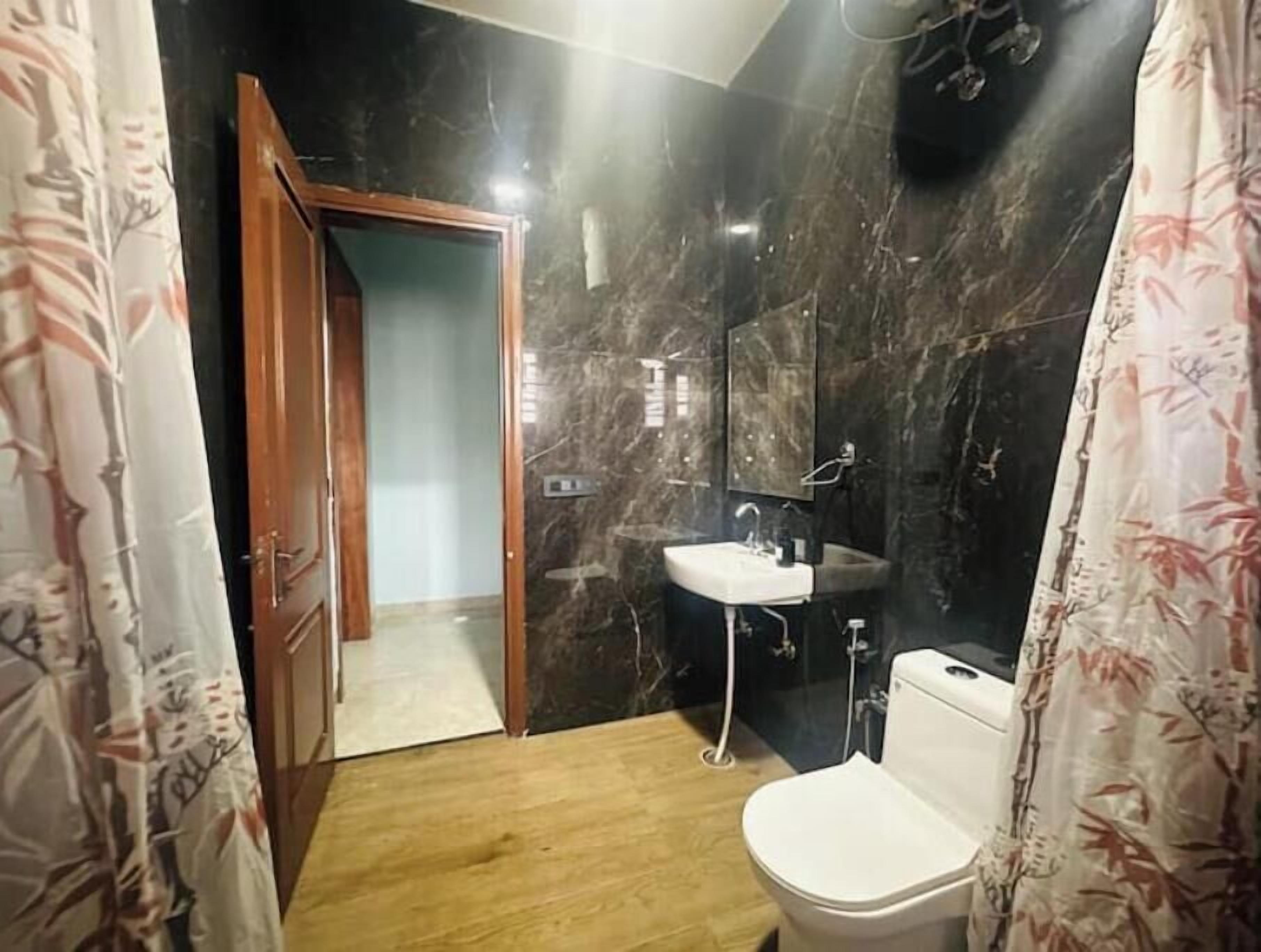 Bidet, towels, soap, toilet paper