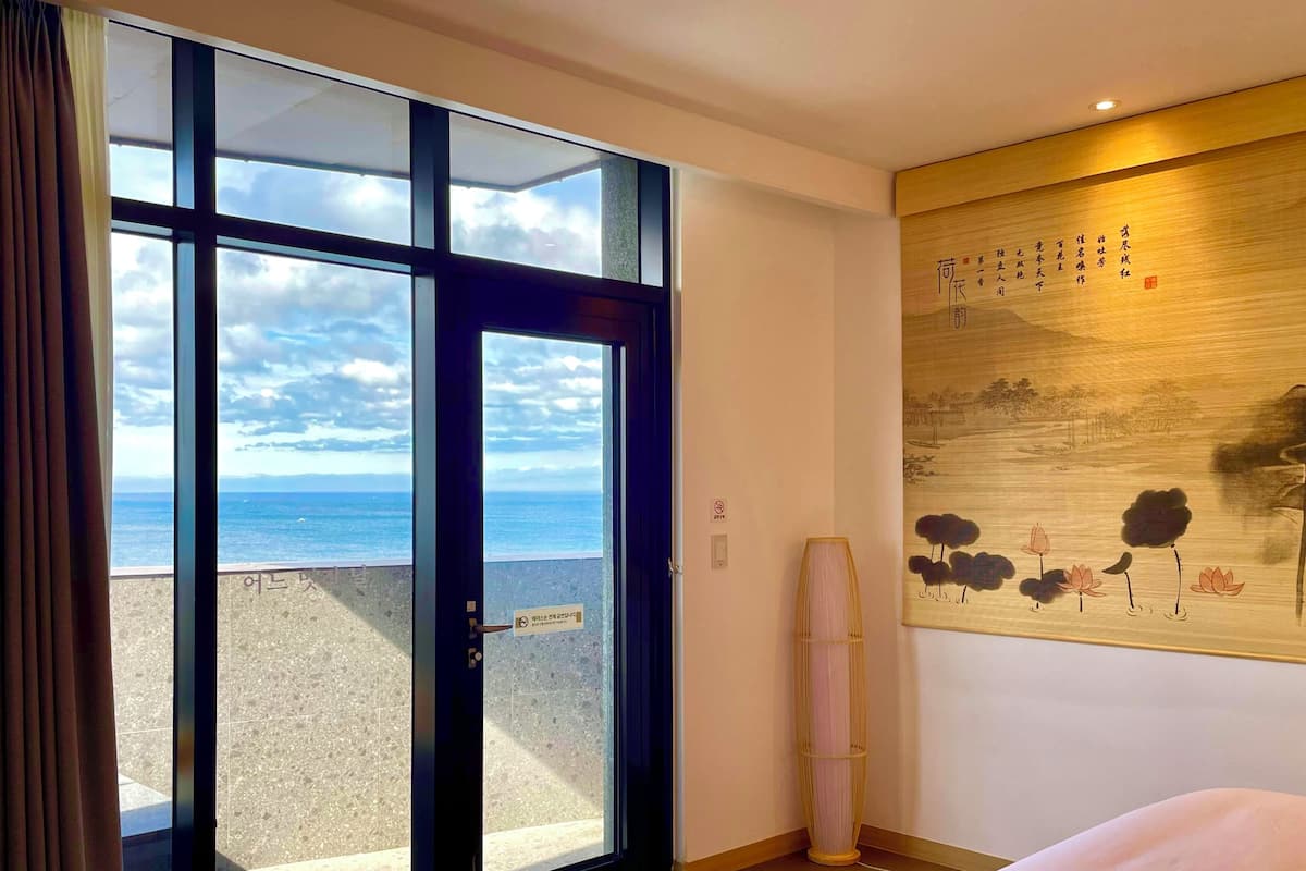 Chambre luxueuse, vue sur la plage | Accès au Wi-Fi (inclus)
