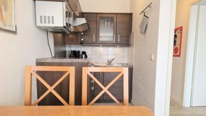 Private kitchen - Ferienwohnung mit Balkon und Fitnessbereich in Sellin (Sellin)