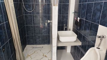 Hair dryer, bidet, towels, soap
