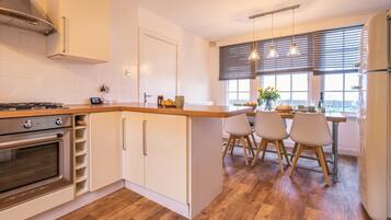 Microwave, oven, dishwasher, high chair