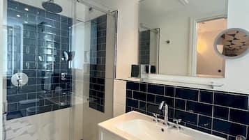 Shower, slippers, towels, soap