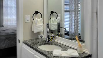 Hair dryer, towels, soap, shampoo