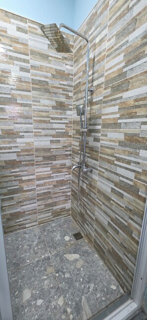 Shower, towels, soap, toilet paper - 2-bedroom apartment in soothing Herstelling, East Bank Demerara with AC (Demerara-Mahaica)