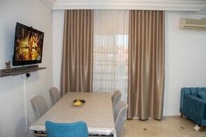 Family Apartment, Balcony, Garden View | Dining - résidence Nesrine-Hammemet sud (Hammamet)