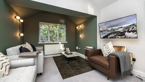 A living room with a sofa, a coffee table, and a TV. - 2 Bed in Crook O Lune (oc-h36291) (Halton)