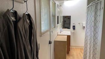 Shower, hair dryer, shampoo