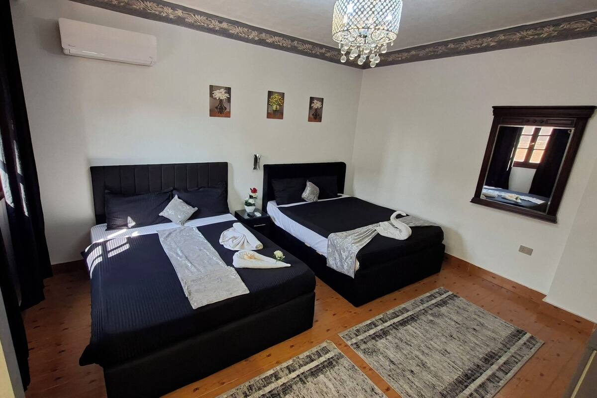 Deluxe Triple Room, Desert View | Laptop workspace, free WiFi