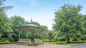 A gazebo in a park with benches and trees. - 1 Bed in Hexham (oc-g37537) (Hexham)