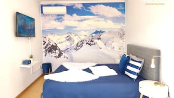 Apartment, Patio, City View | Iron/ironing board, free WiFi