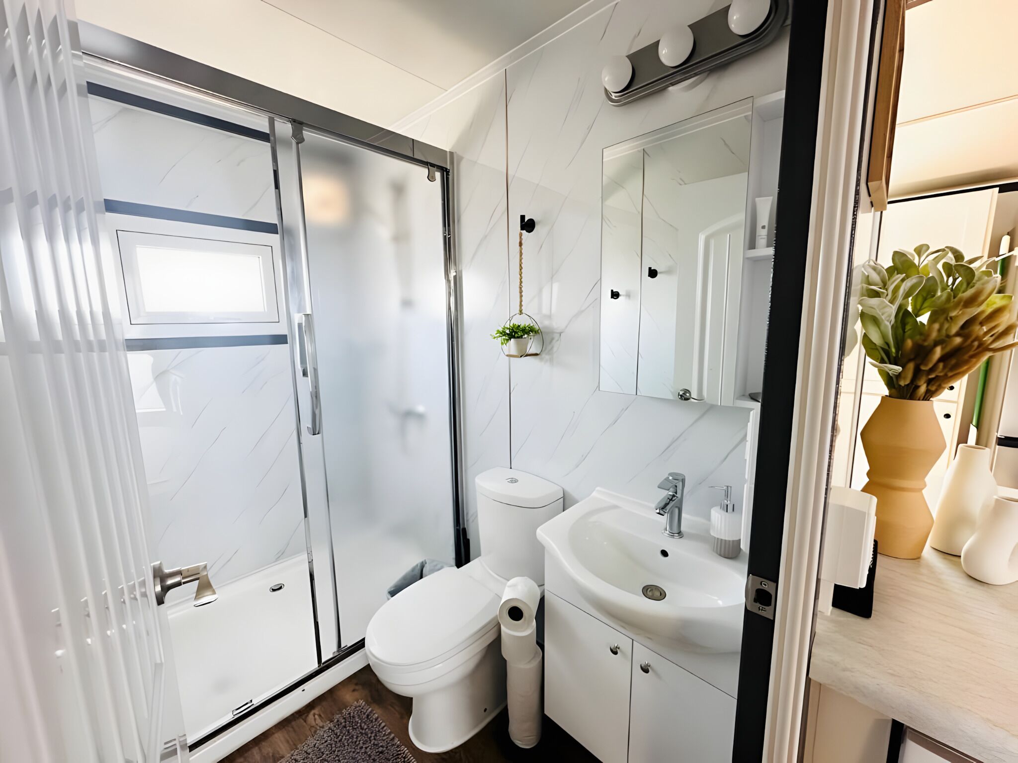 Shower, towels, soap, toilet paper