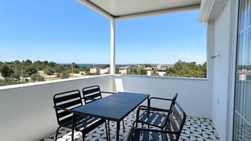 Quadruple Room, Sea View | Outdoor dining