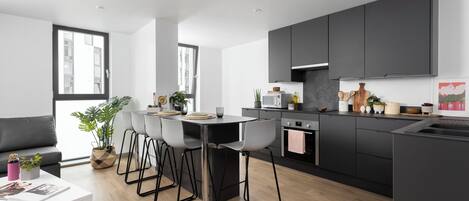 Chambre Simple Classique, non-fumeur, salle de bains privée | Équipements de cuisine partagée