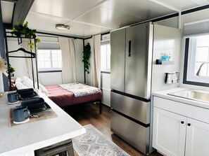 Room - Private Studio Suite with Queen and Full Beds, Full Kitchen and In-Unit Laundry (Pecos)