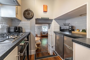 Microwave, oven, high chair, cookware/dishes/utensils - 2 Bed in Outgate (oc-lr086) (Outgate)
