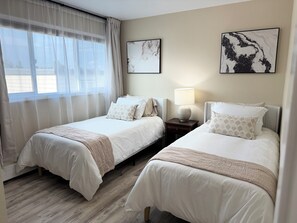 2 slaapkamers, een strijkplank/strijkijzer, wifi, beddengoed
