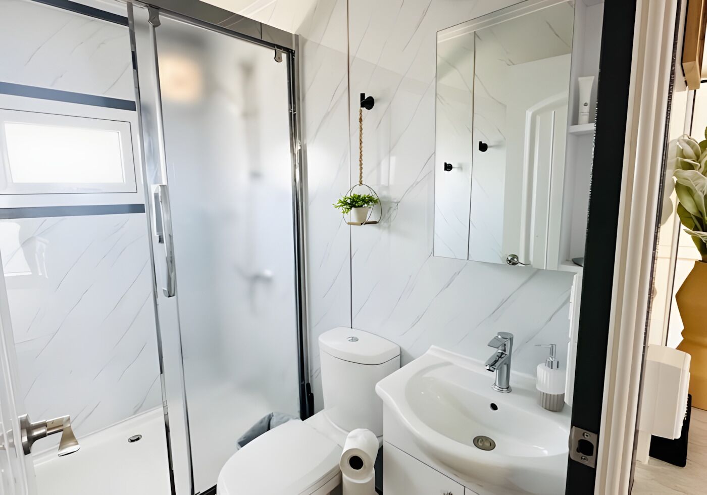 Shower, towels, soap, toilet paper