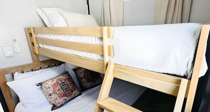 Two Private Bedrooms with Queen and Bunk Beds, Full Kitchen and In-Unit Laundry
