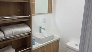 Shower, towels, soap, toilet paper