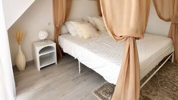 2 habitaciones, tabla de planchar con plancha, wifi y ropa de cama