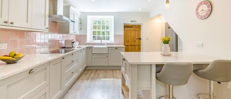 Oven, dishwasher, high chair, cookware/dishes/utensils