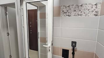 Departamento Deluxe, balcón, vista a la ciudad | Baño