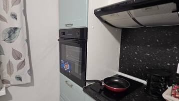 Deluxe-Apartment, Balkon, Stadtblick | Eigene Küche