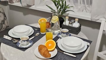Departamento Deluxe, balcón, vista a la ciudad | Restaurantes