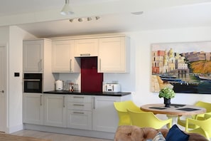 Oven, dishwasher, highchair, cookware/dishes/utensils