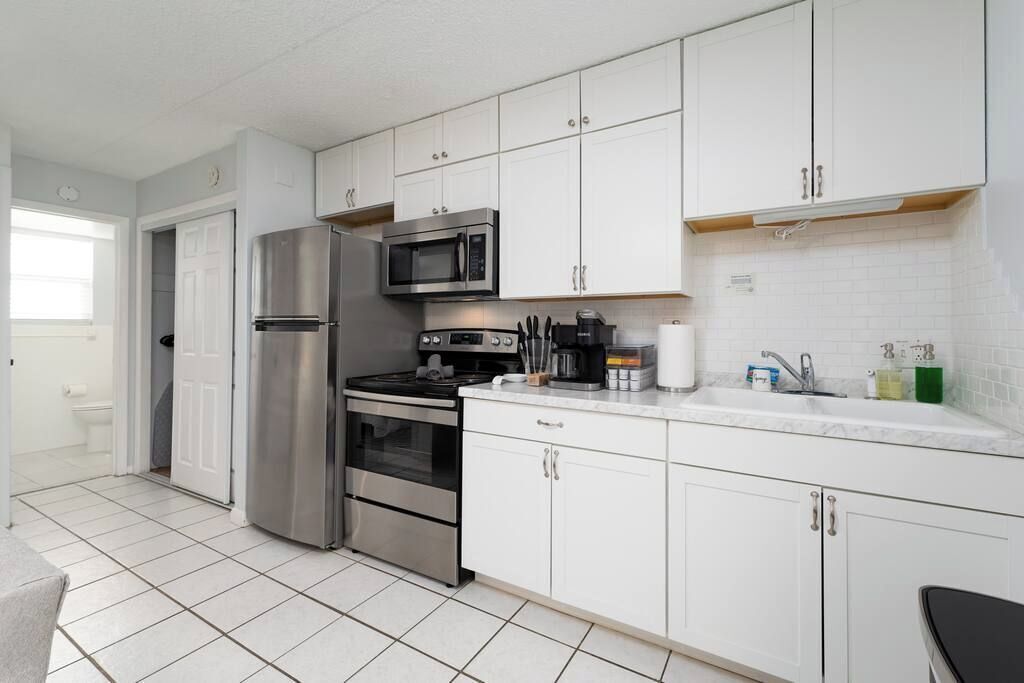 Fridge, stovetop, coffee/tea maker, cookware/dishes/utensils