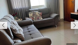 Apartamento Confort, vistas a la ciudad | Zona de estar