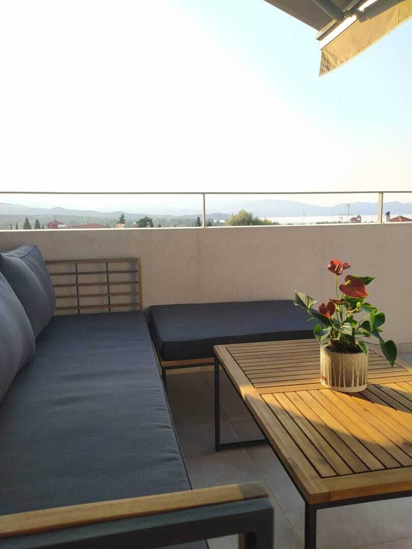 Design suite, uitzicht op zee | Terras