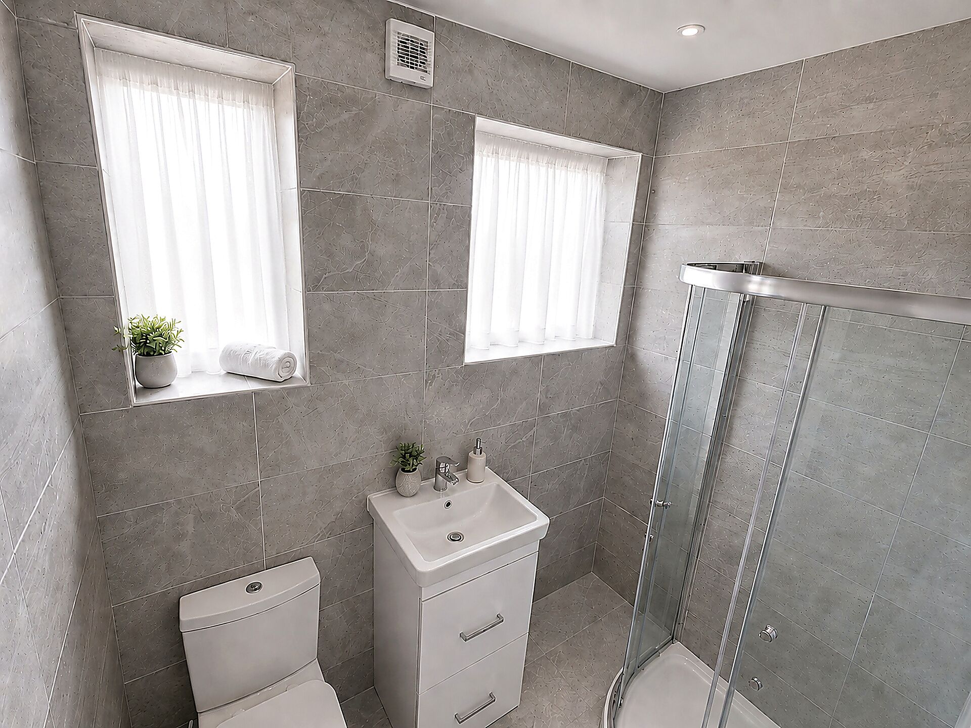 Shower, towels, soap, toilet paper