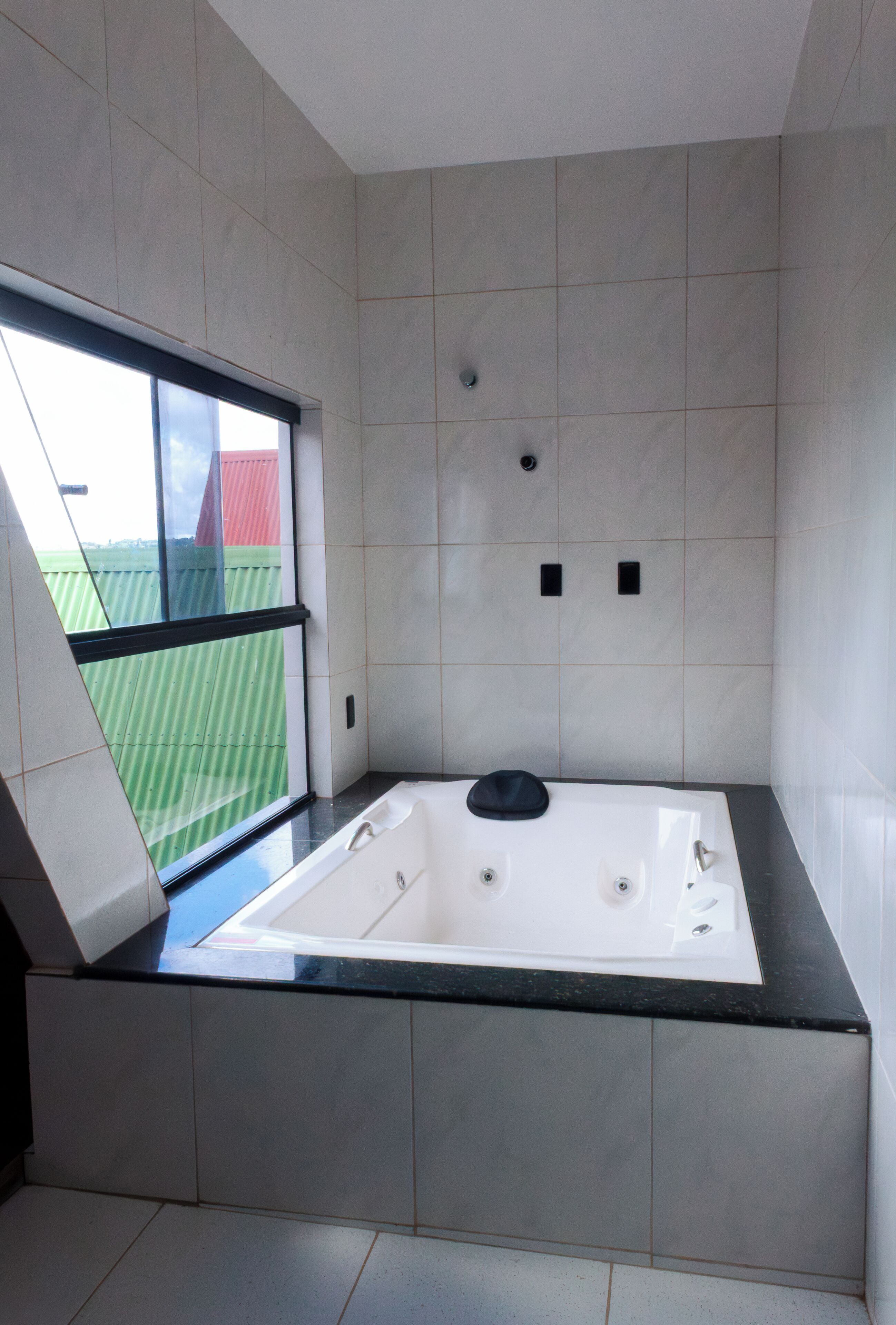 Superior Triple Room, Lake View | Bathroom | Separate tub and shower, free toiletries, hair dryer, towels