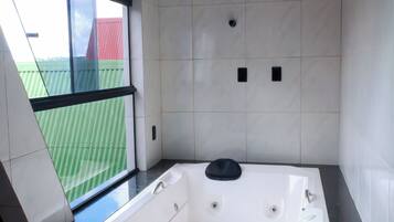 Superior Triple Room, Lake View | Bathroom | Separate tub and shower, free toiletries, hair dryer, towels