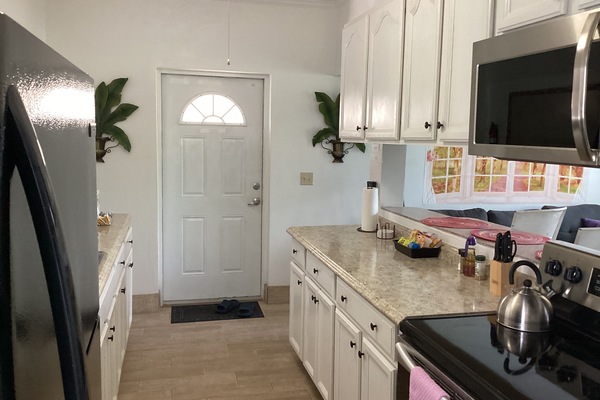Condo, Non Smoking, Garden View | Private kitchen | Coffee/tea maker, full-size fridge, microwave, oven