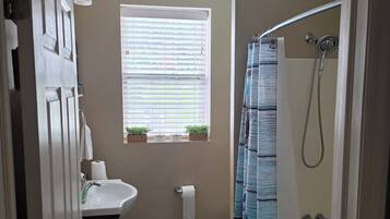 Hair dryer, towels, soap, shampoo