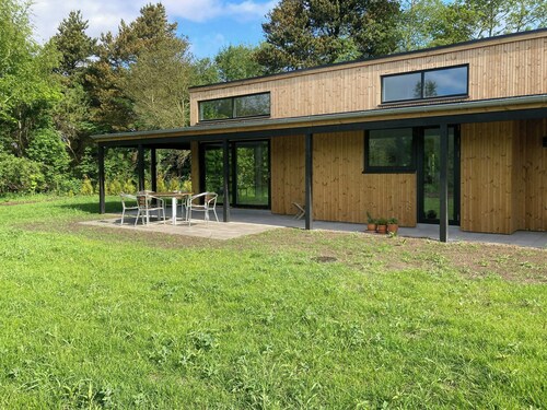 Modern wooden house near Kollerup Forest