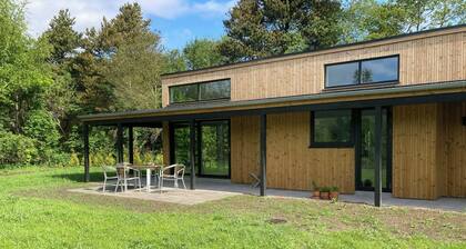 Modern wooden house near Kollerup Forest