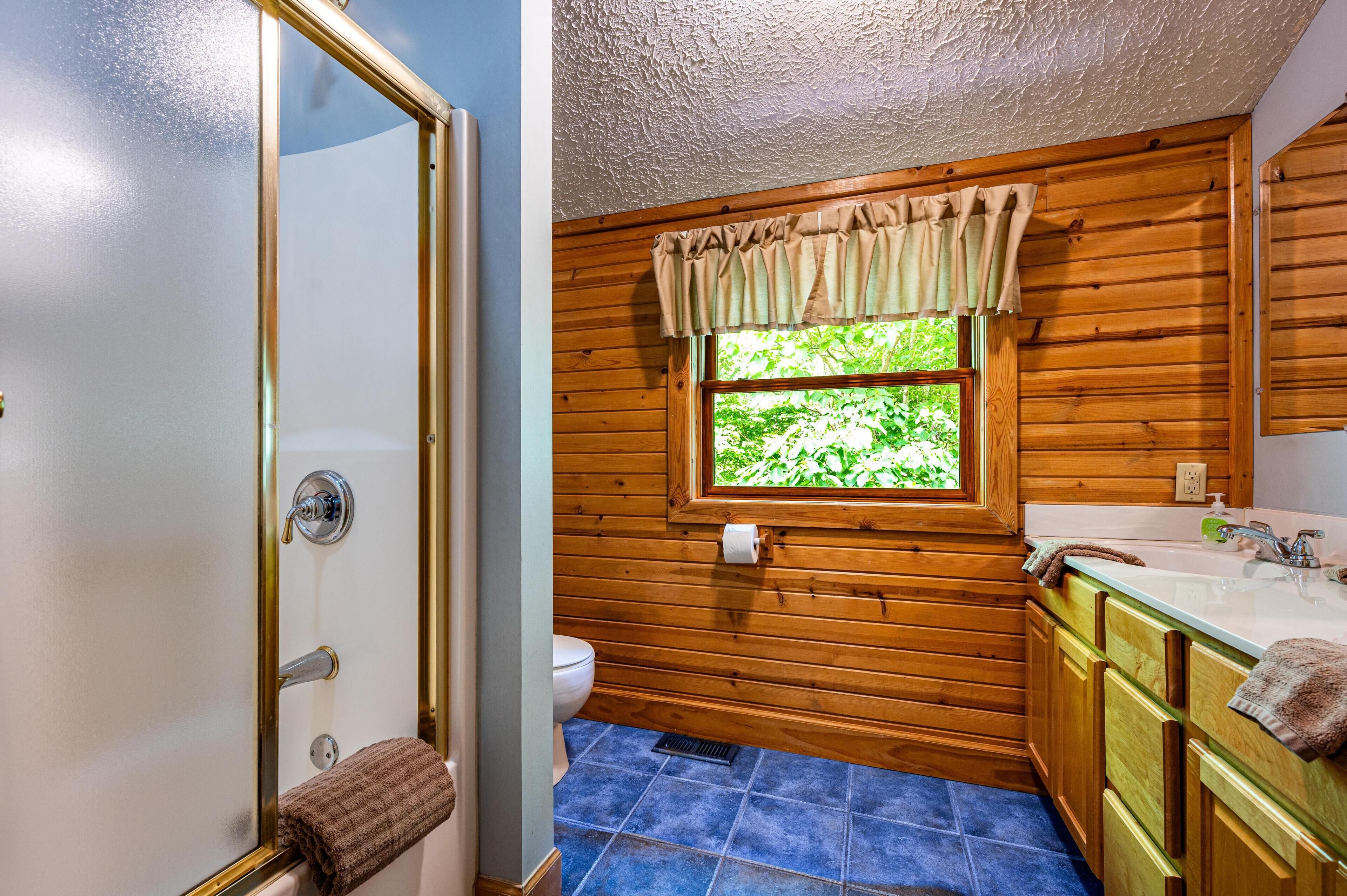 Shower, jetted tub, hair dryer, towels
