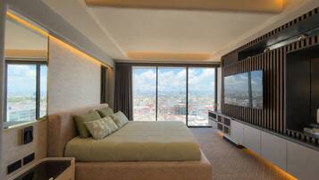 Suite de lujo, vista a la ciudad | Tabla de planchar con plancha y wifi gratis