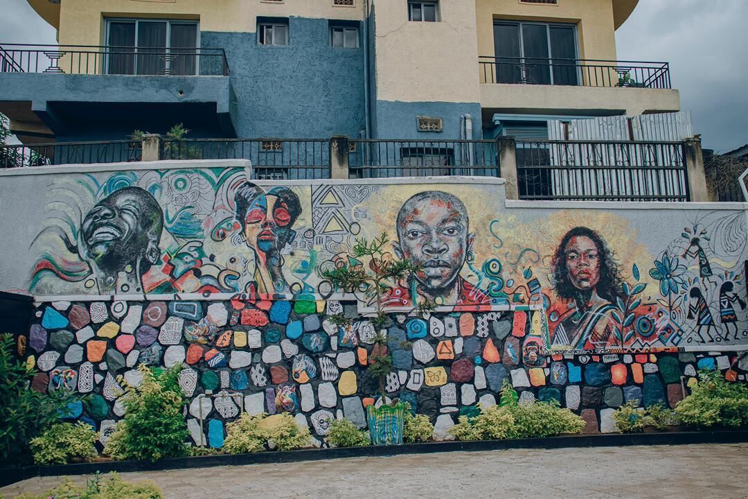 A colorful mural on a building's facade.