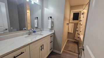 Hair dryer, towels, soap, toilet paper