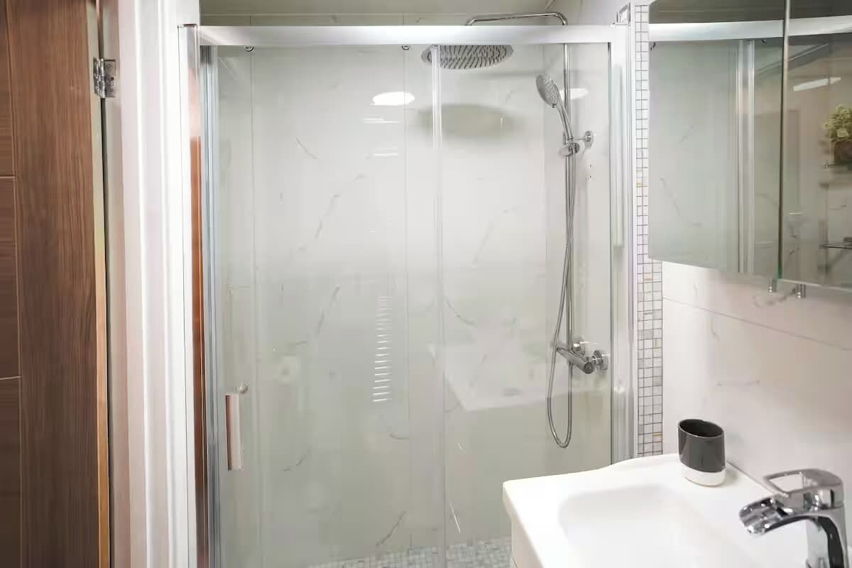Hair dryer, towels, soap, toilet paper