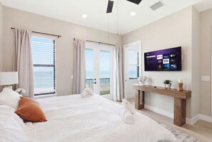 Iron/ironing board, WiFi, bed sheets - Sunset Oasis: Beachfront Bliss with 2 Pools, Fire Pits & Room for 16 (Melbourne Beach)