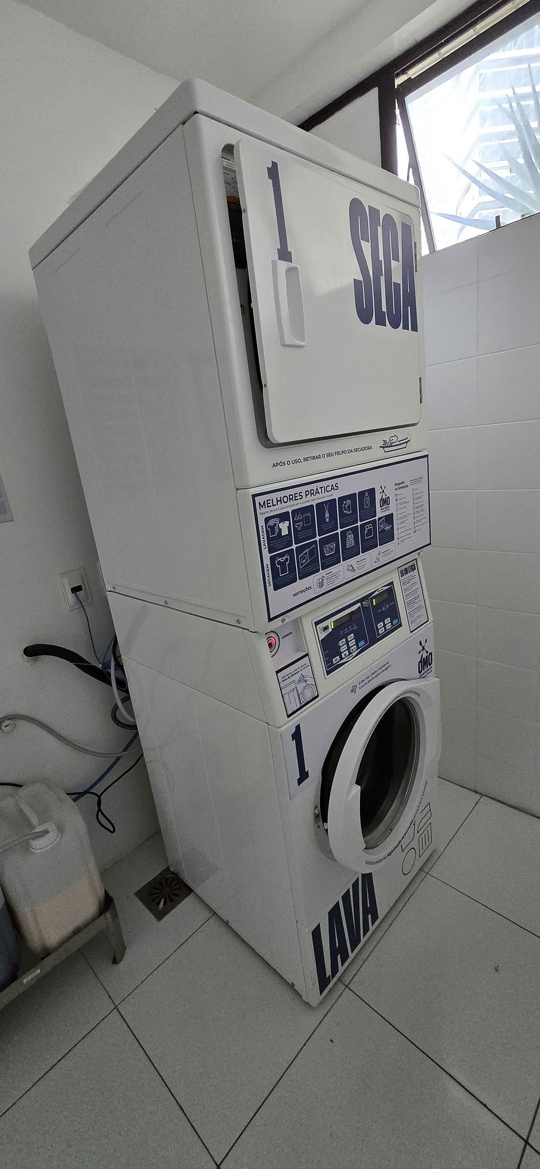 A compact, white laundry machine with a control panel and a front-loading door, labeled 'SEGA' and 'LAVA'.