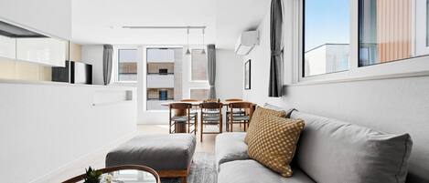Appartement | Coin séjour | Télévision à écran plat de 50 pouces avec chaînes numériques
